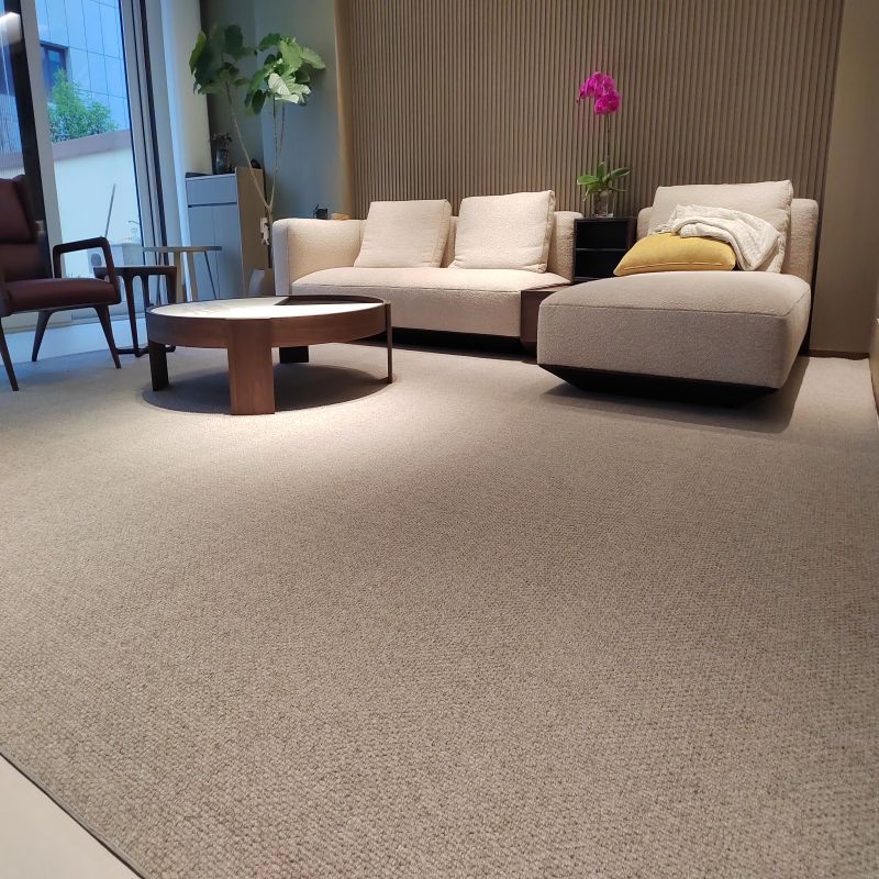 Machine tufted wool carpet with non-slip fabric on the back of the carpet